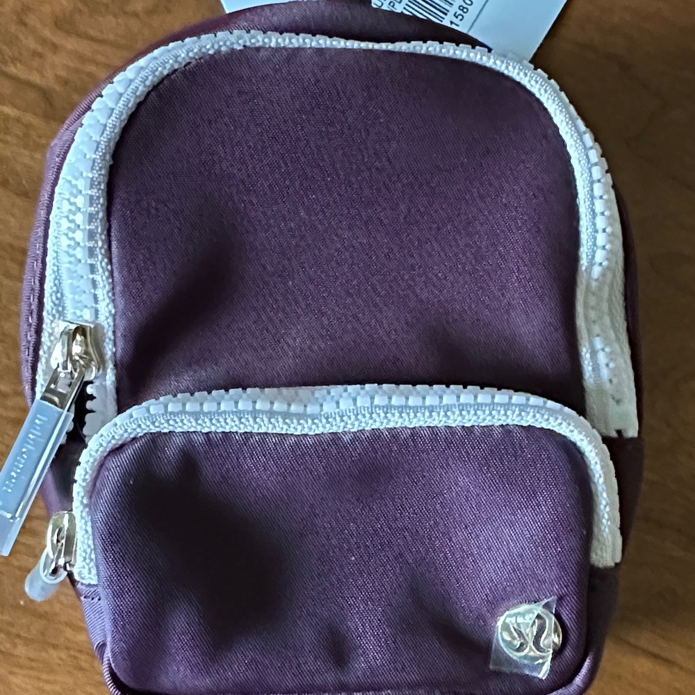 lululemon athletica Everywhere Nano Backpack  - Plum with Light Pink Trim NWT - Picture 13 of 13